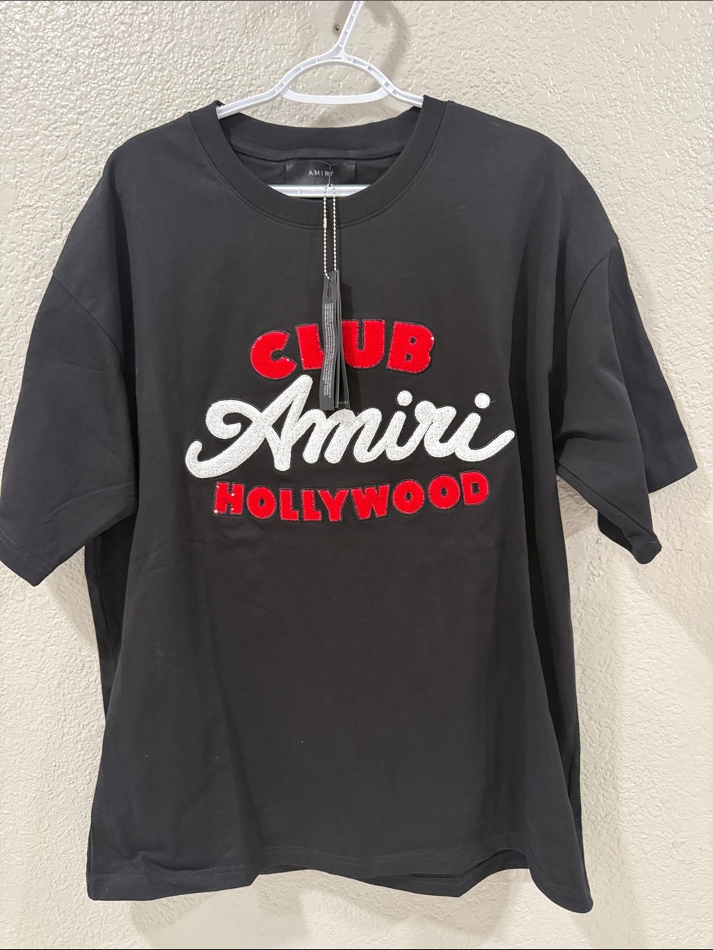AMIRI Black Tee with Red & White Club Hollywood Script